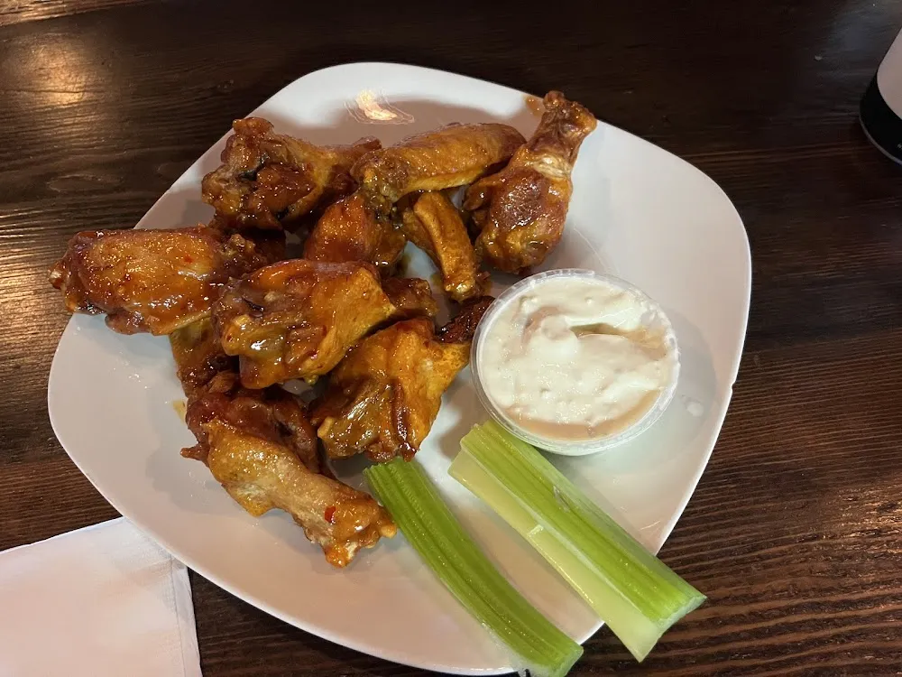 Mango Habanero Wings with Blue Cheese and Celery